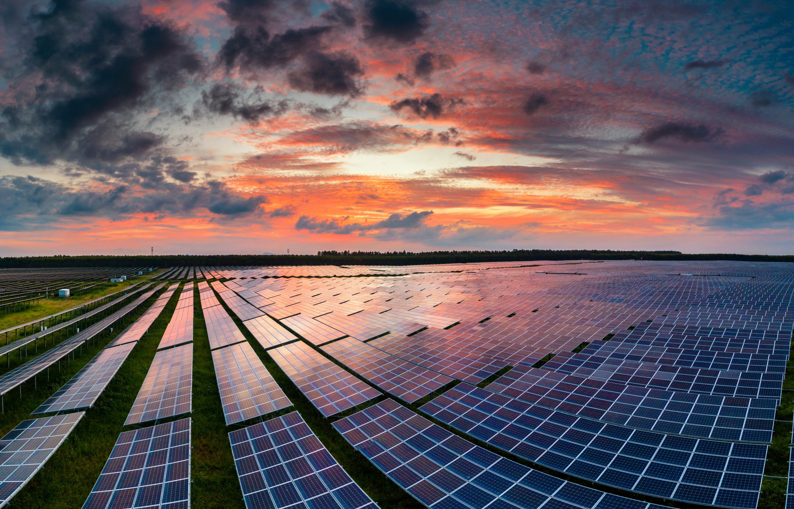 Large solar farm in Melbourne at sunset generating renewable energy across Victoria